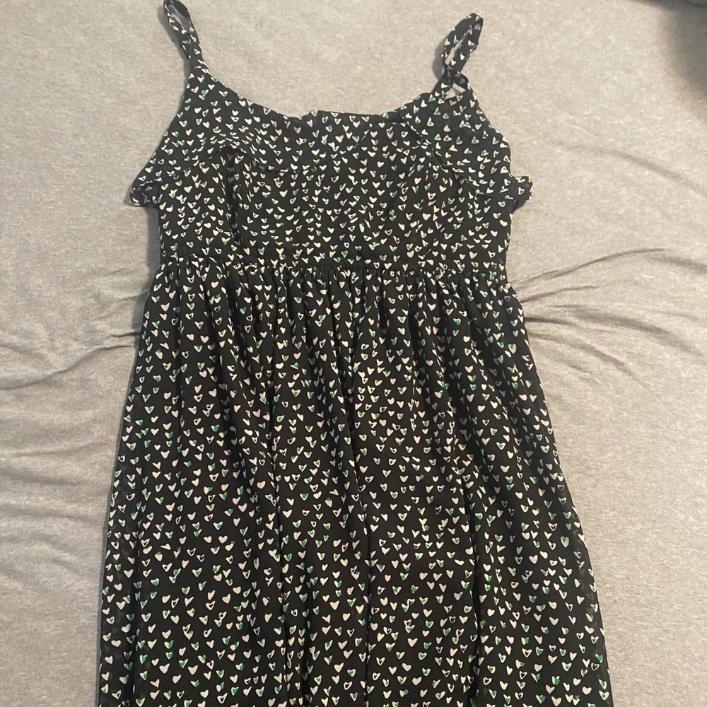 Black dress with green and white hearts
